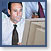 image of man looking at computer screen